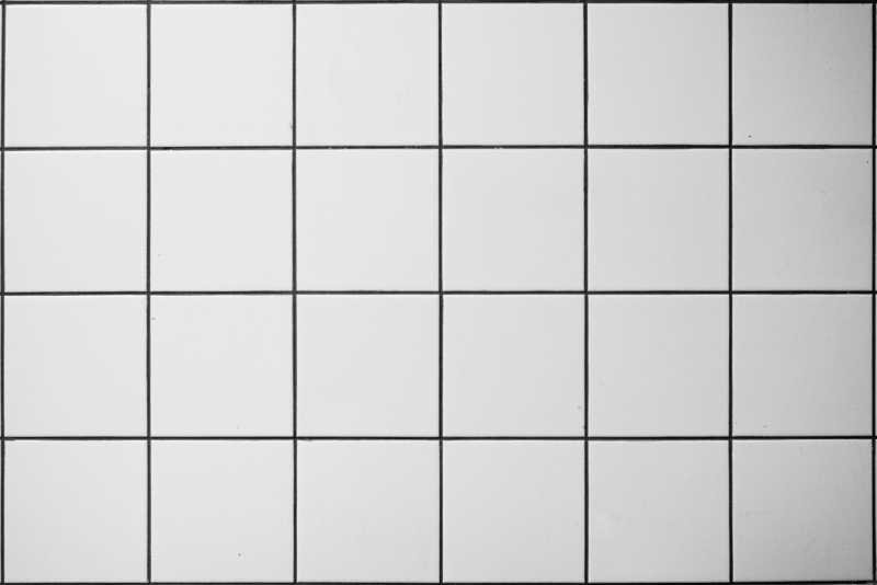 Белая квадратная плитка с черной затиркой