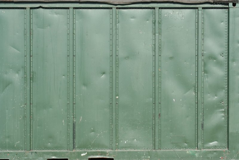 Текстура зелёного железного забора