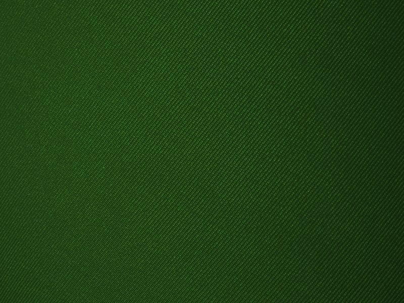 Темно зеленая ткань