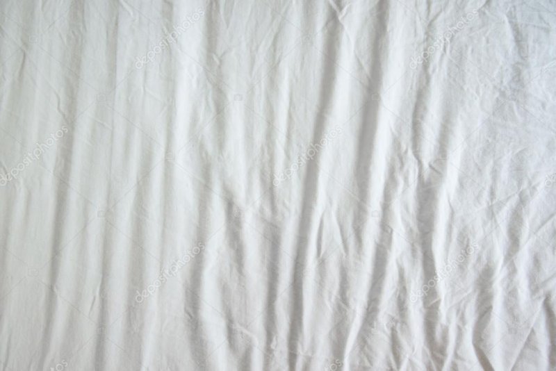Белая ткань складки