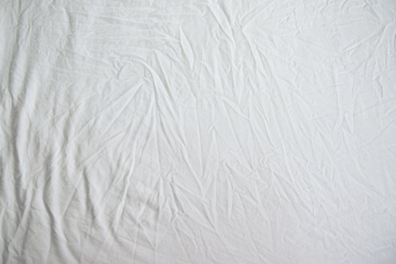 Мятая белая ткань