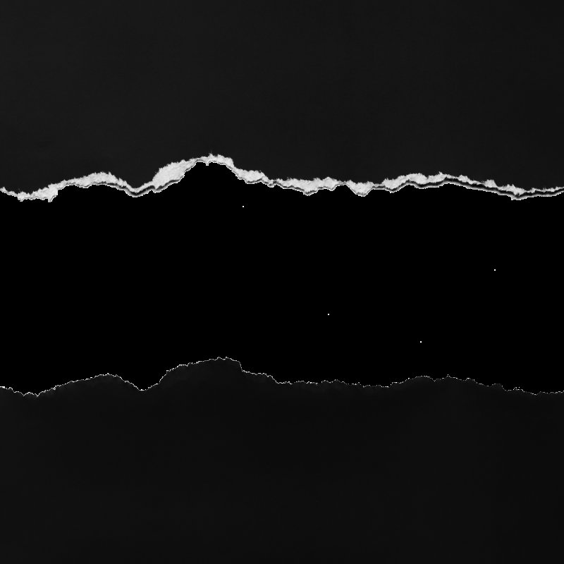 Оторванный кусок бумаги на черном фоне