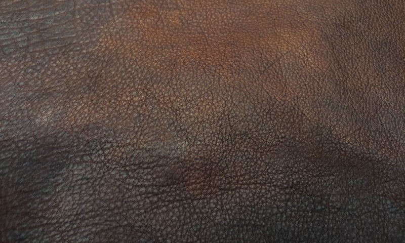 Коричневая кожа