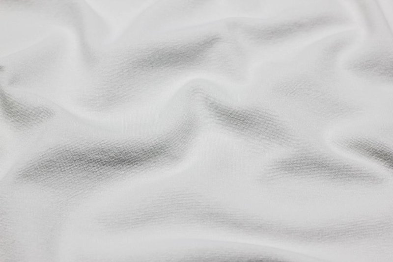 Белая мягкая ткань