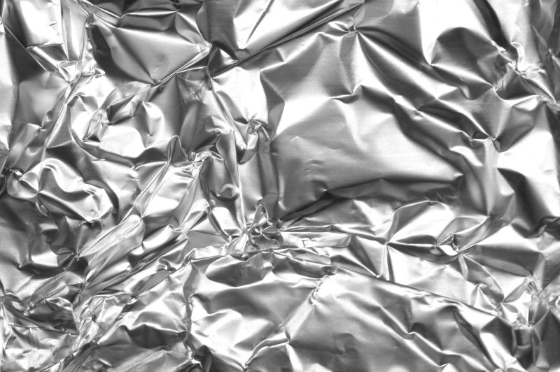Мятая серебряная фольга