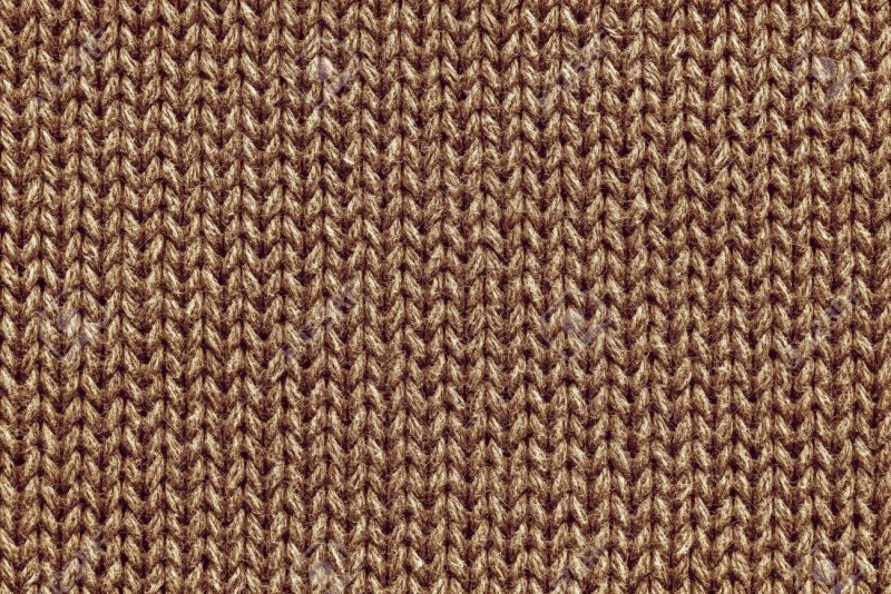 Бежевая вязаная ткань