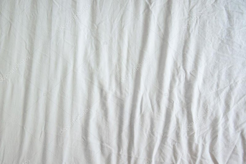 Белая ткань складки