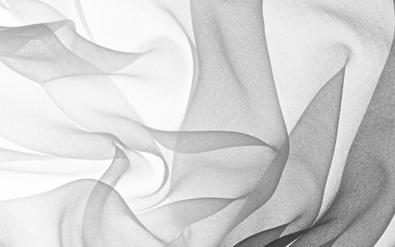 Белая фактурная ткань