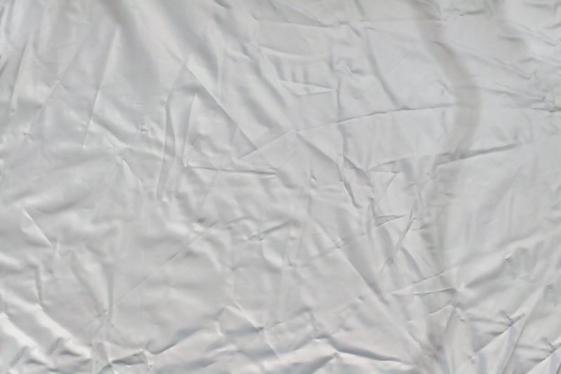 Мятая белая ткань