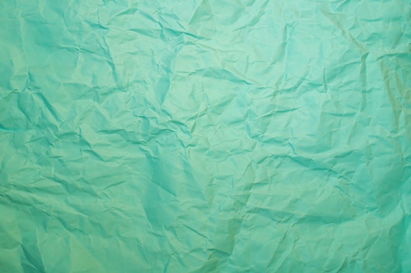Мятая бирюзовая бумага
