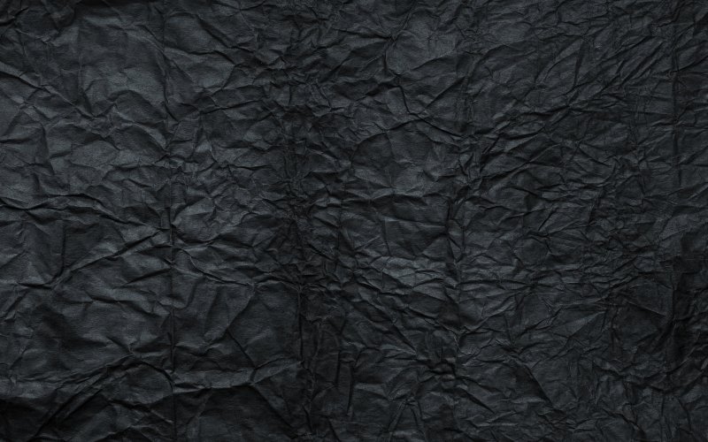 Черная мятая бумага