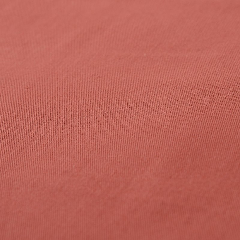 Ткань кораллового цвета