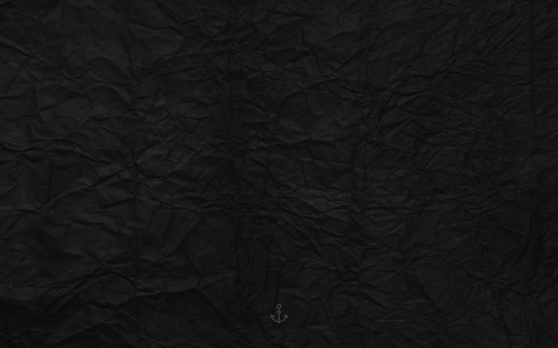 Черная мятая бумага фон