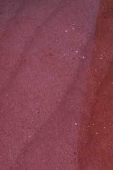 Малиновый гранит Шокша текстура