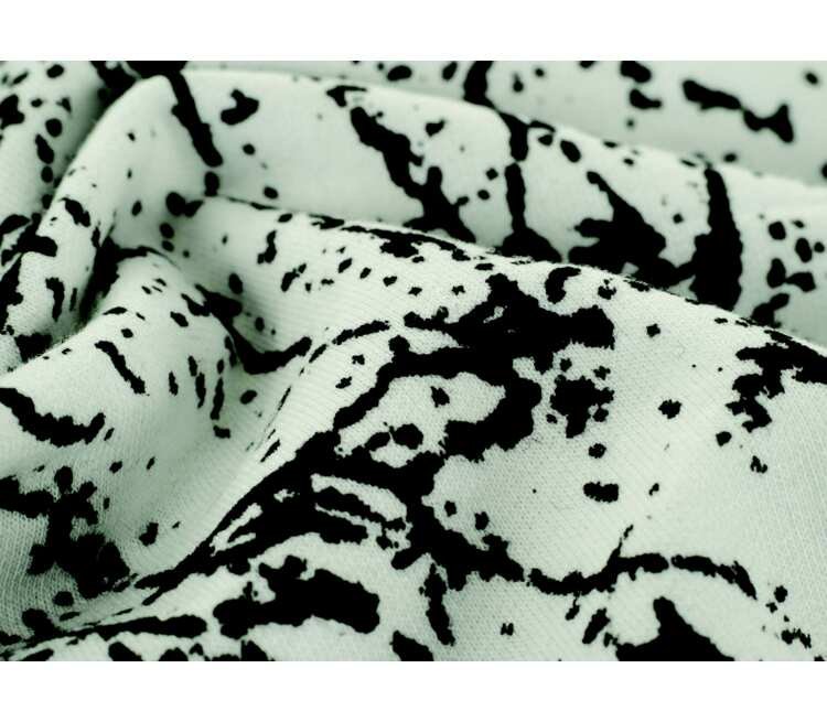 Ткань с черно белым принтом