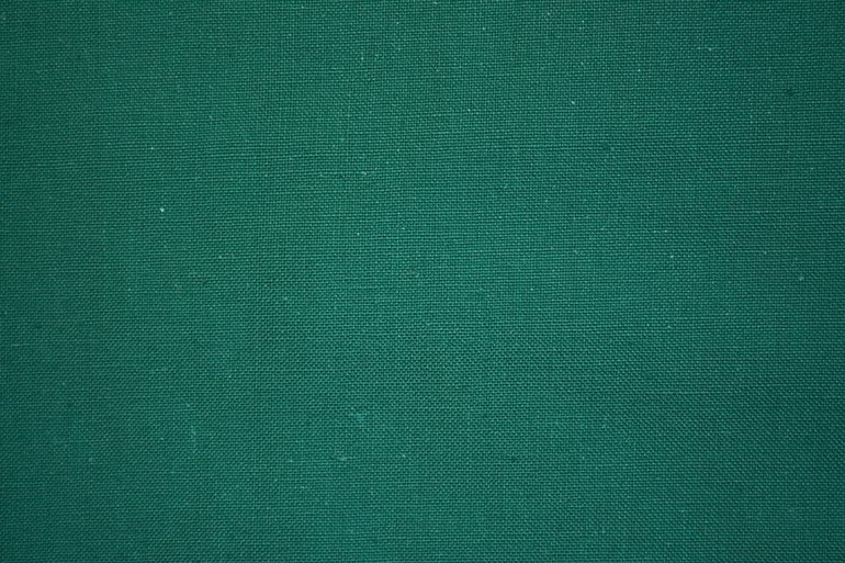 Темно зеленая ткань
