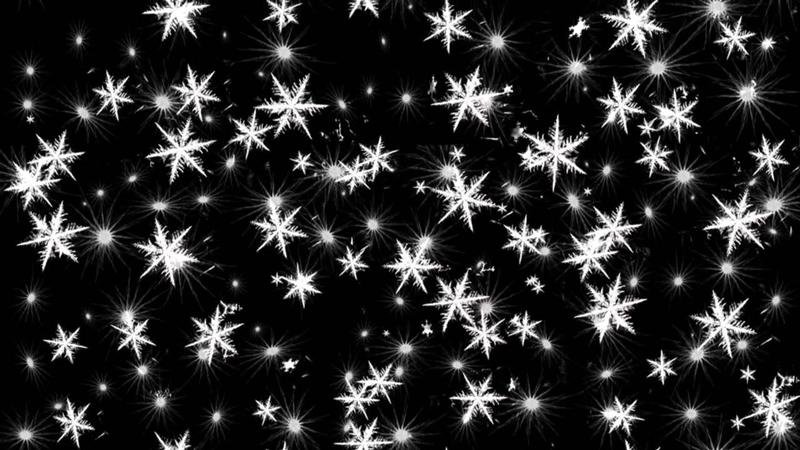 Снежинки на черном фоне