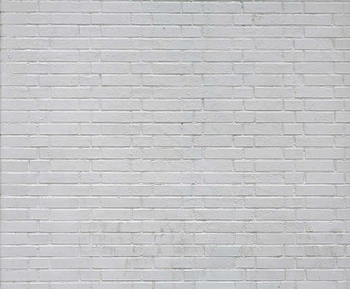 Белая кирпичная стена