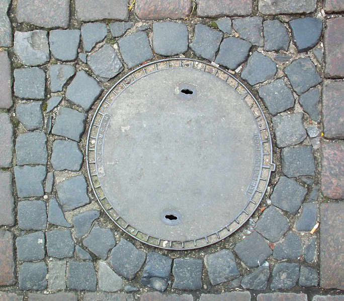 Текстура люка канализационного