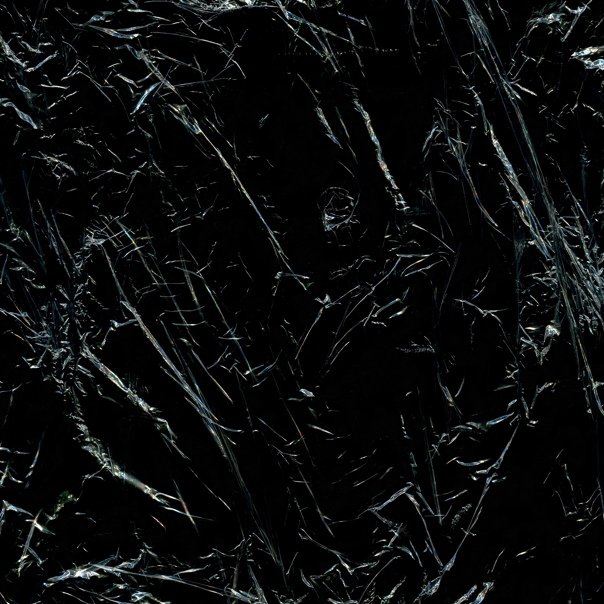 Мятая черная пленка