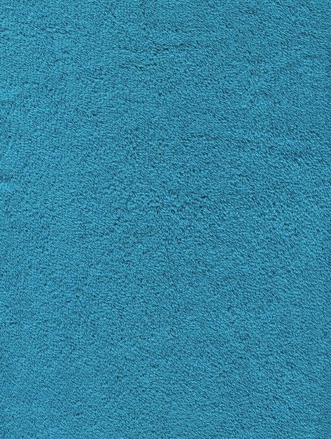 Зеленое махровое полотенце текстура