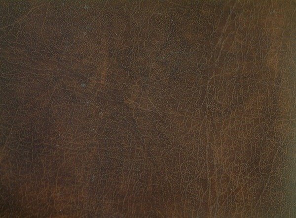 Потертая коричневая кожа