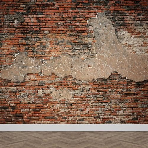 Разрушенная кирпичная стена