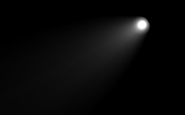 Лучи света на черном фоне