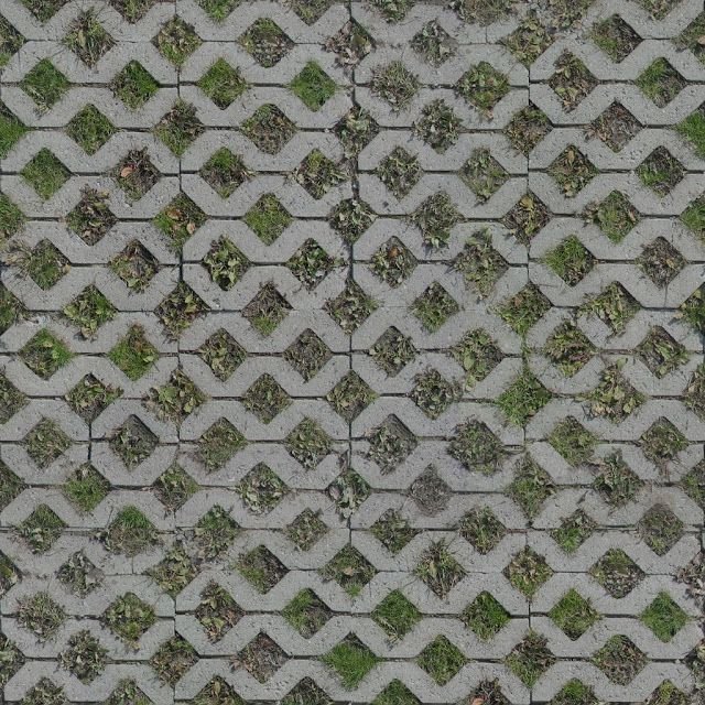 Текстура тротуарной плитки с травой