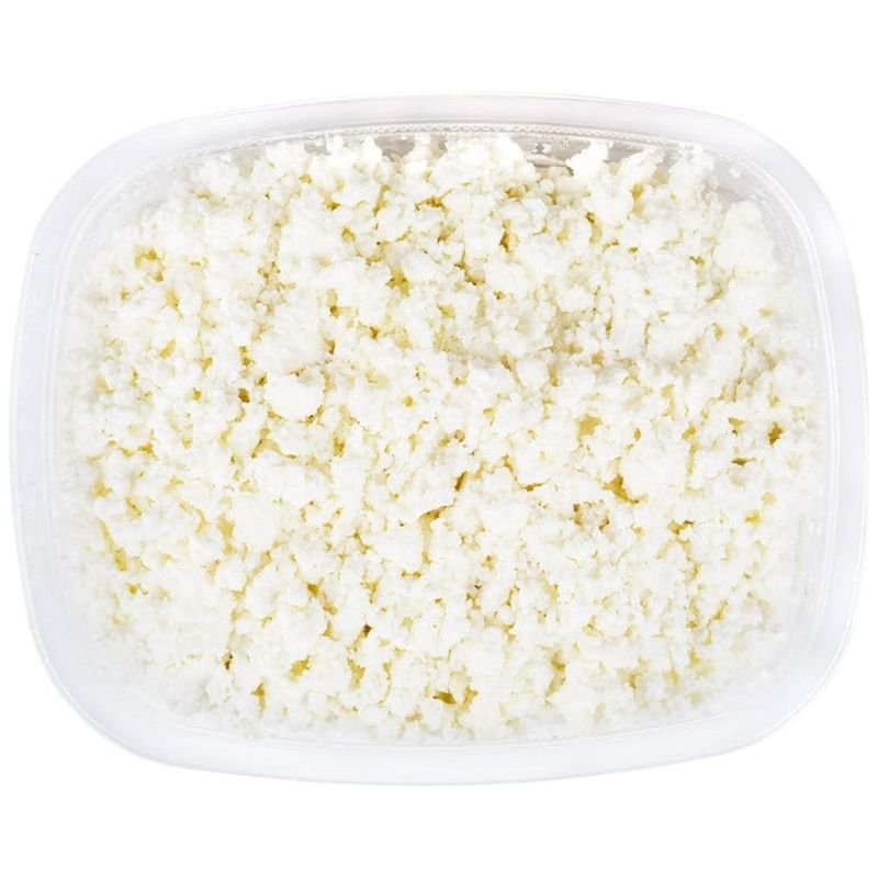 Творог в контейнере