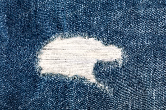 Текстура рваных джинс