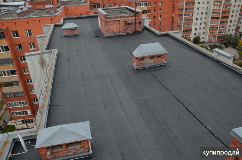 Плоские крыши многоэтажных домов