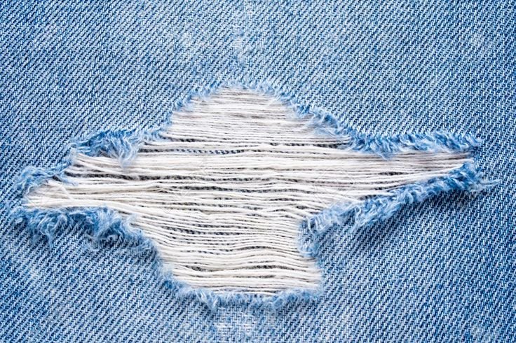 Текстура рваных джинс