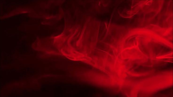 Красный дым на черном фоне