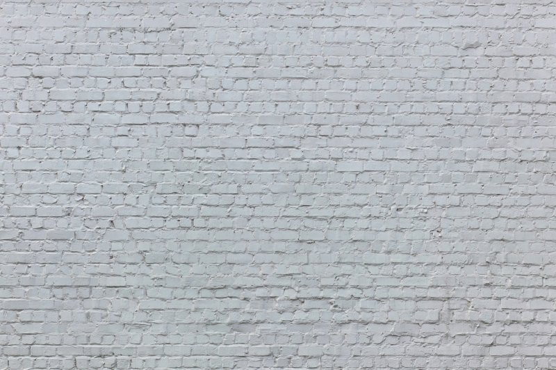 Белая кирпичная стена