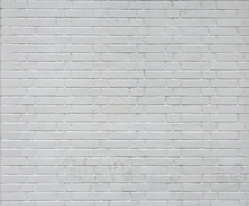 Белая кирпичная стена