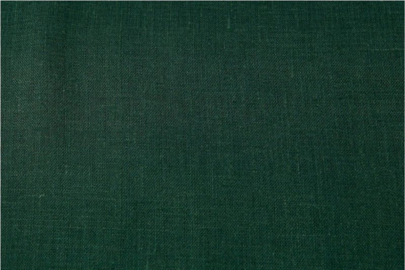 Темно зеленая ткань
