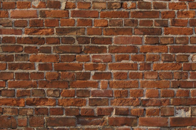 Серая кирпичная стена