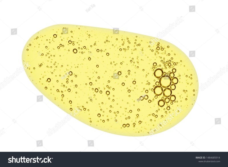 Капли масла на белом фоне