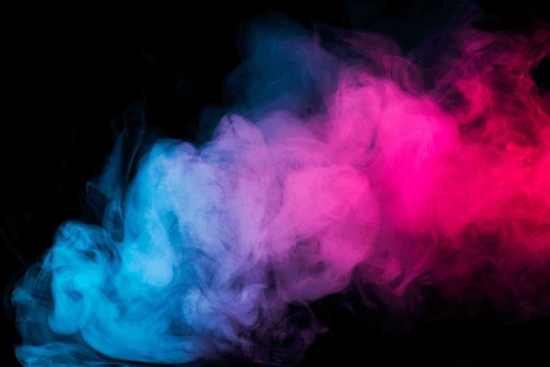 Цветной дым на черном фоне