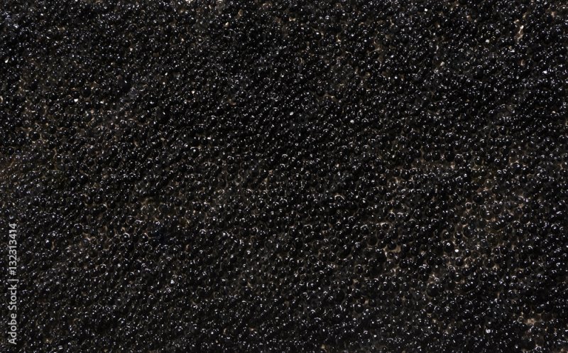 Икра на черном фоне