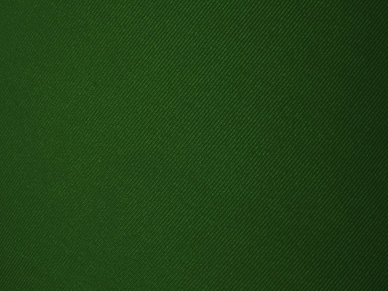 Темно зеленая ткань