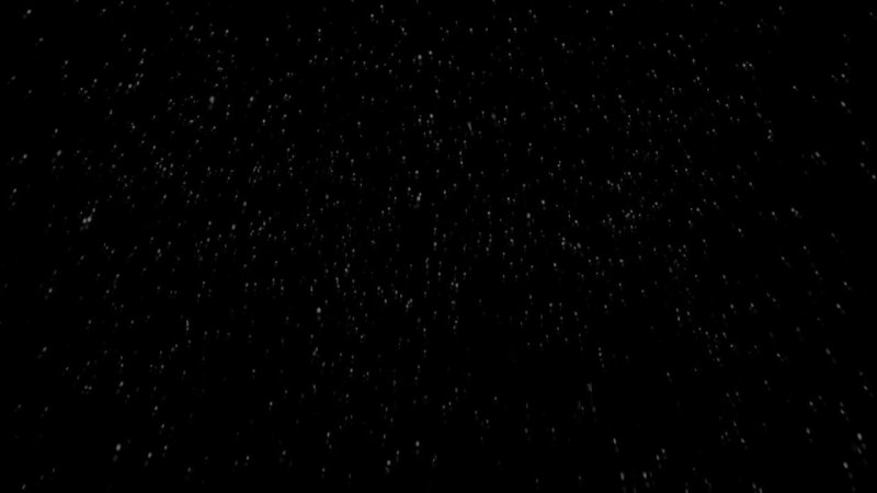 Снегопад на черном фоне