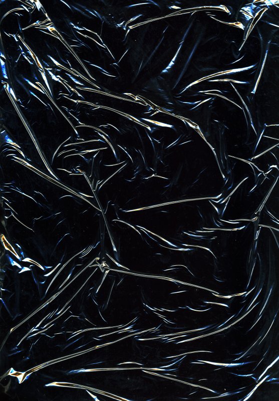 Мятая черная пленка