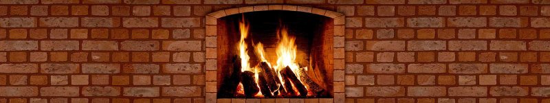 Огонь на кирпичной стене для камина