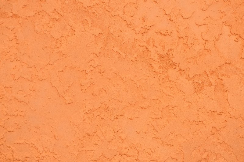 Оранжевая штукатурка текстура