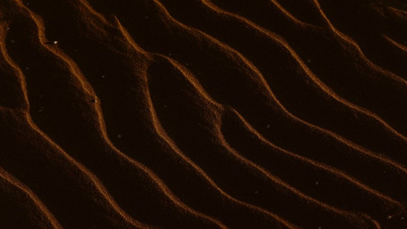 Коричневый песок