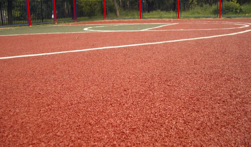 Тартановое покрытие для спортивных площадок