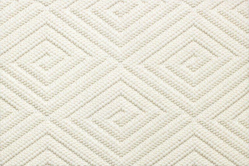 Белая вязаная ткань