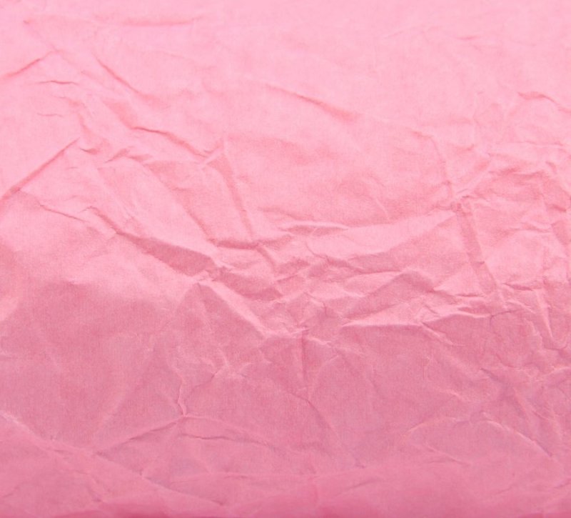 Мятая розовая бумага